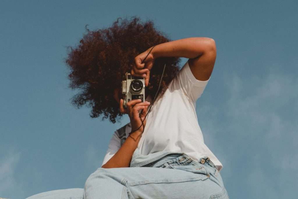 Image of a girl taking a picture