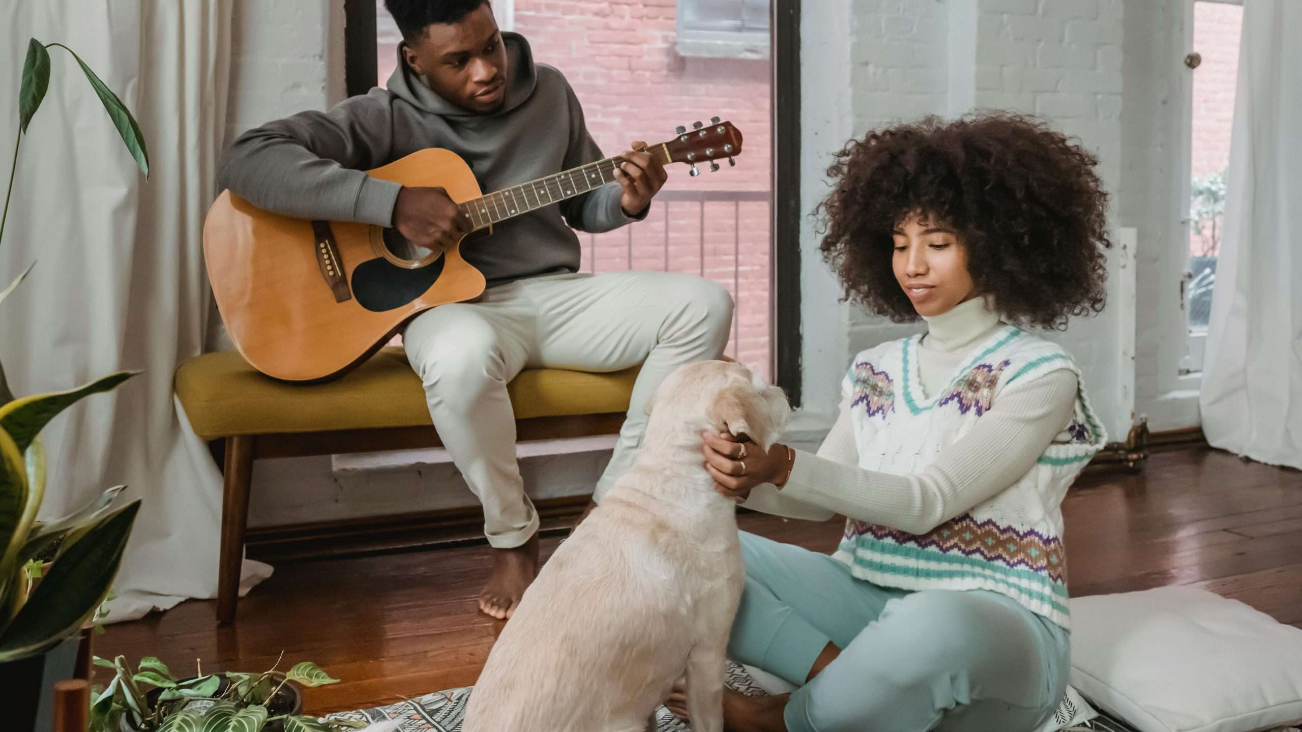 An image of a dog listening to music